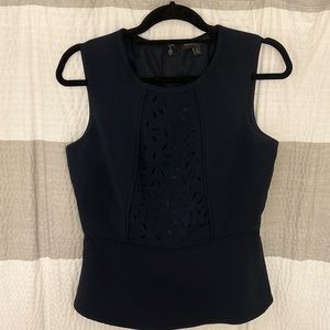 Banana Republic women’s sleeveless babydoll blouse. Navy color, size 4.